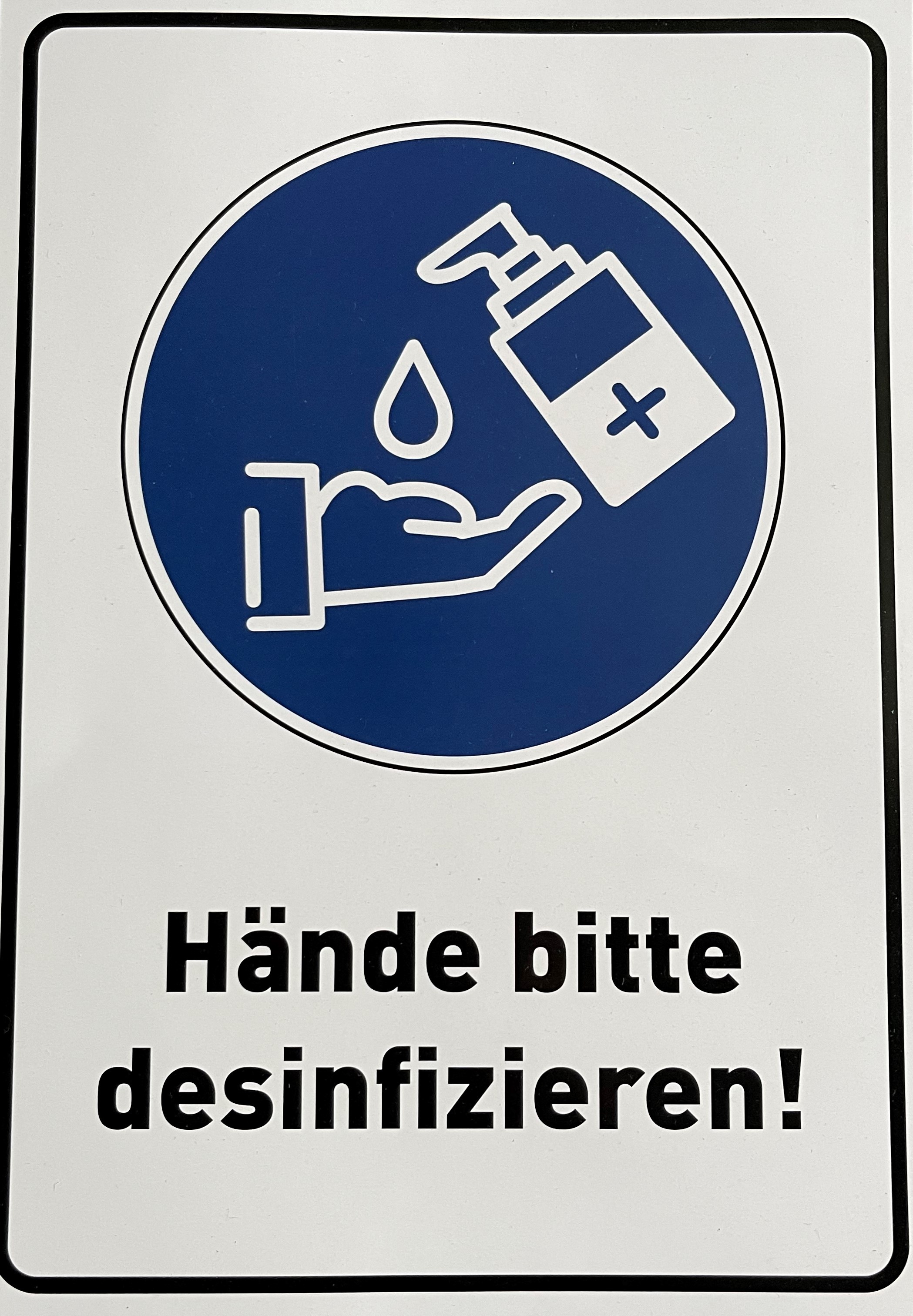 Hinweisschild "Hände bitte desinfizieren"
